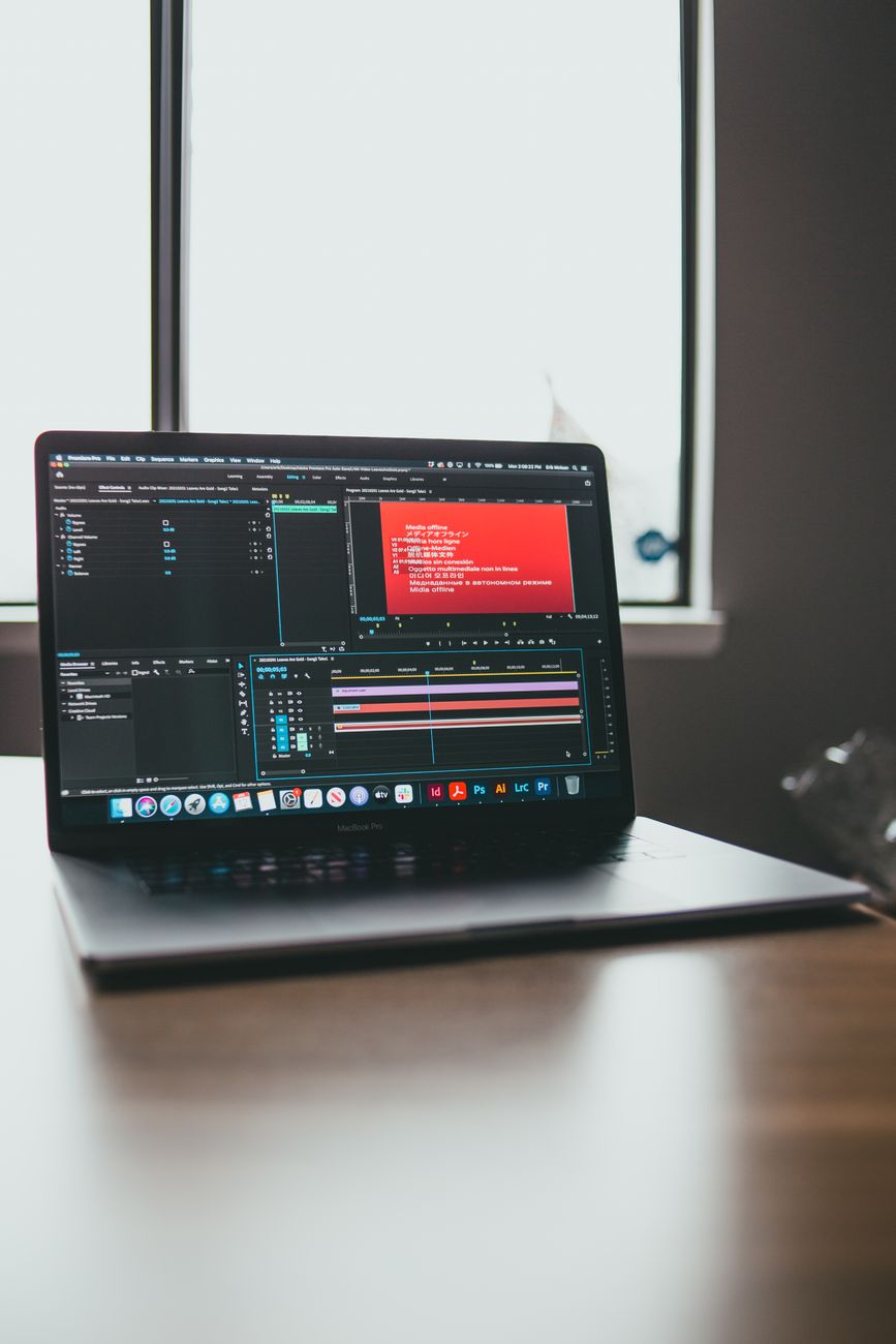 Video editor editing cinema project on screens